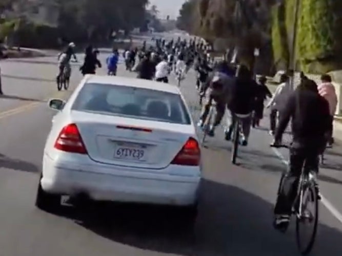 Who's in the Wrong? Hundreds of California Teens Blocking Traffic on Their Bikes Beat The Shit Out of Mercedes Driver Who Tried to Run Them Over