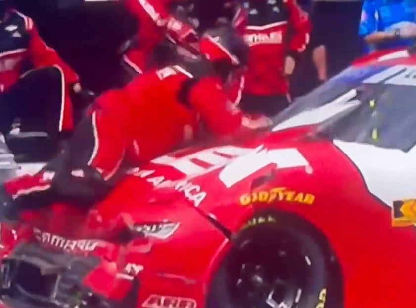 NASCAR Pit Crew Member Does Full Belly Flop To Flatten Out The Hood Of A Car, Locks Up Locker Room Guy Of The Year Award